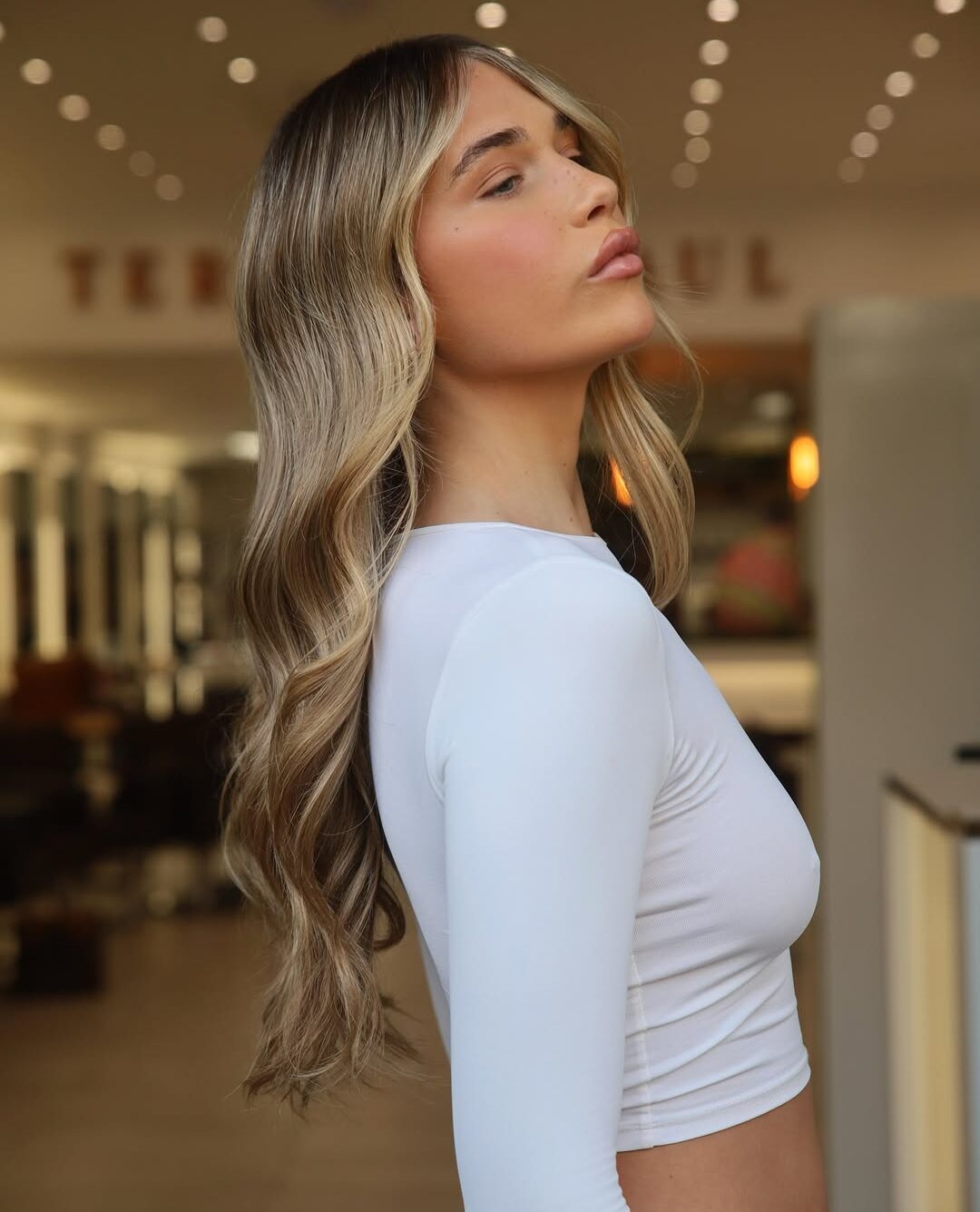 Terence Paul model with glossy blonde hair